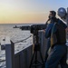 USS America (LHA 6) Sailors participate in gun shoot drill.