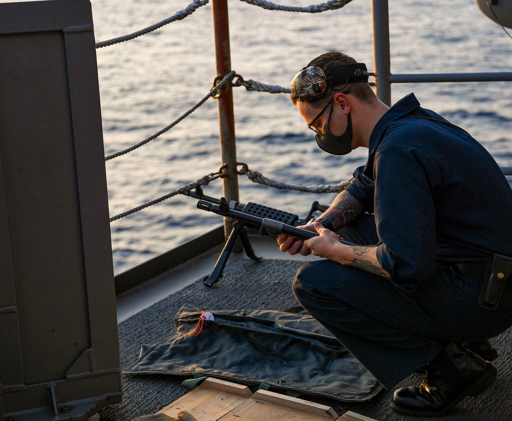 USS America (LHA 6) Sailors participate in gun shoot drill.
