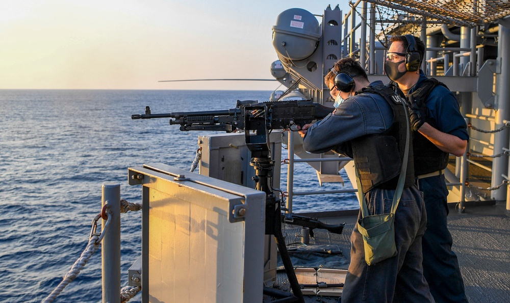 USS America (LHA 6) Sailors participate in gun shoot drill.