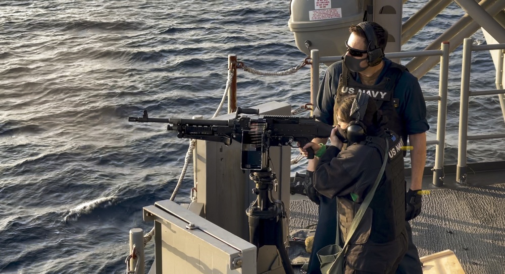 USS America (LHA 6) Sailors participate in gun shoot drill.
