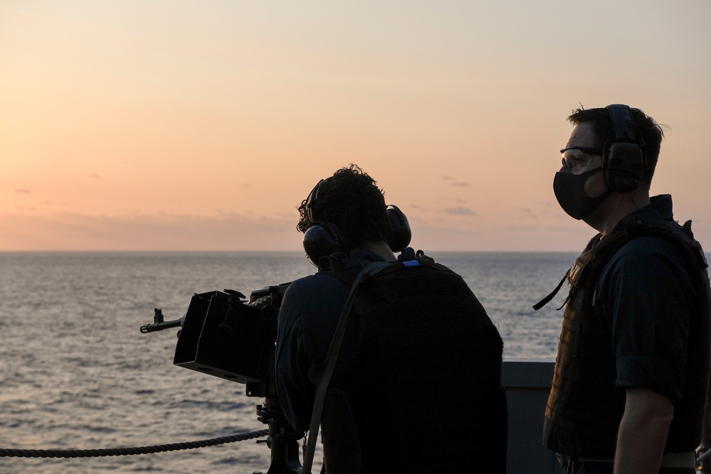 USS America (LHA 6) Sailors participate in gun shoot drill.