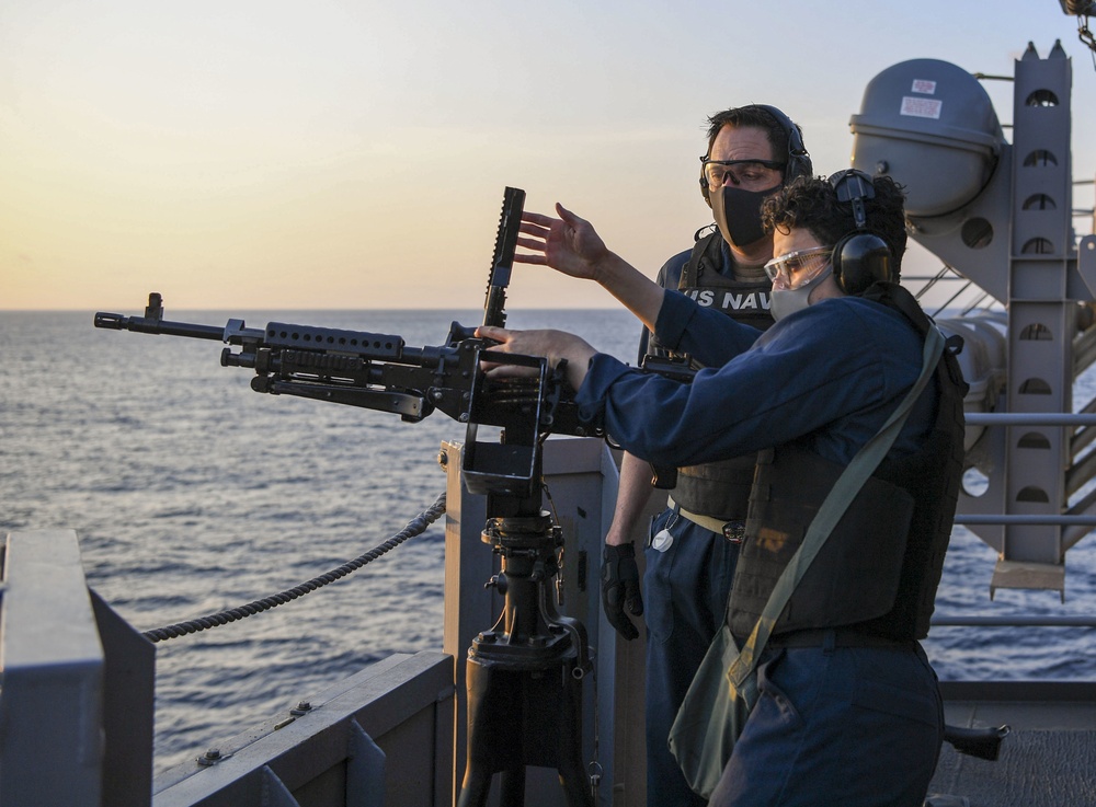 USS America (LHA 6) Sailors participate in gun shoot drill.