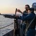 USS America (LHA 6) Sailors participate in gun shoot drill.