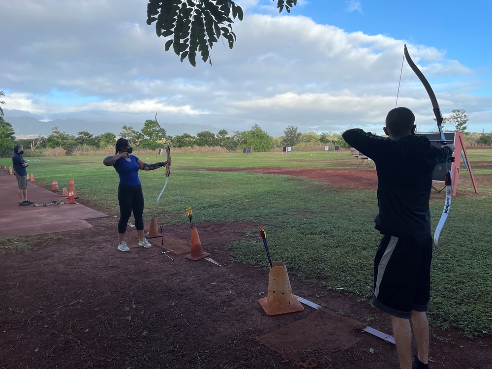 Army Recovery Care Program Soldiers take up ax throwing and archery