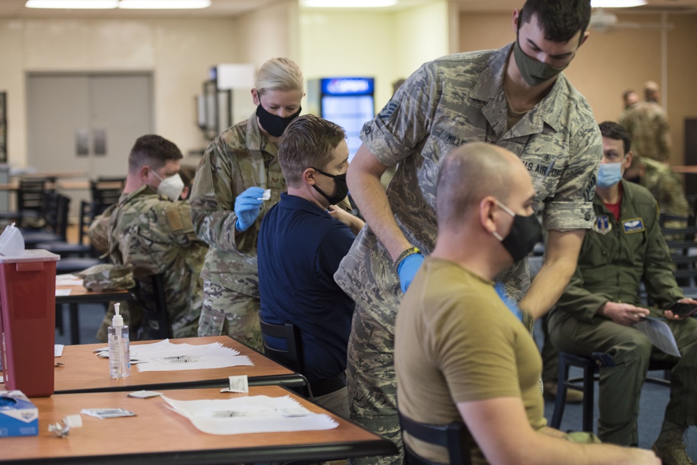 Airmen voluntarily receive COVID-19 vaccine
