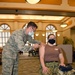 U.S. Army and Air Medics with the MING, 127th Wing, and Task Force Red lion, Administers the COVID-19 Vaccine