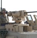 A U.S. Army Soldier assigned to 1-6 IN, 2-1 ABCT, provides security in an M-1 Abrams tank