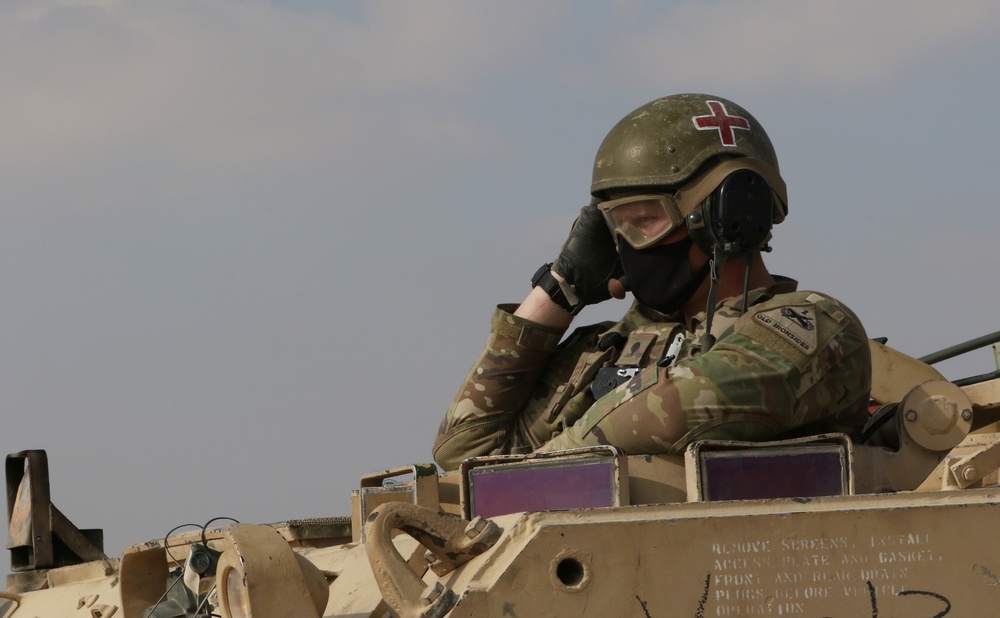 A U.S. Army Medic, 1-6 IN, 2-1 ABCT, waits for an air medevac training mission, Iron Union 14
