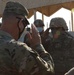 A U.S. Army Soldier from 1st Bn., 6th Inf. Reg., salutes Maj. Gen. Patrick Hamilton, commanding general TFS