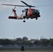 Coast Guard along with Pasco Sheriff Office canine unit conducts canine hoist training at Air Station Clearwater