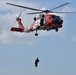 Coast Guard along with Pasco Sheriff Office canine unit conducts canine hoist training at Air Station Clearwater