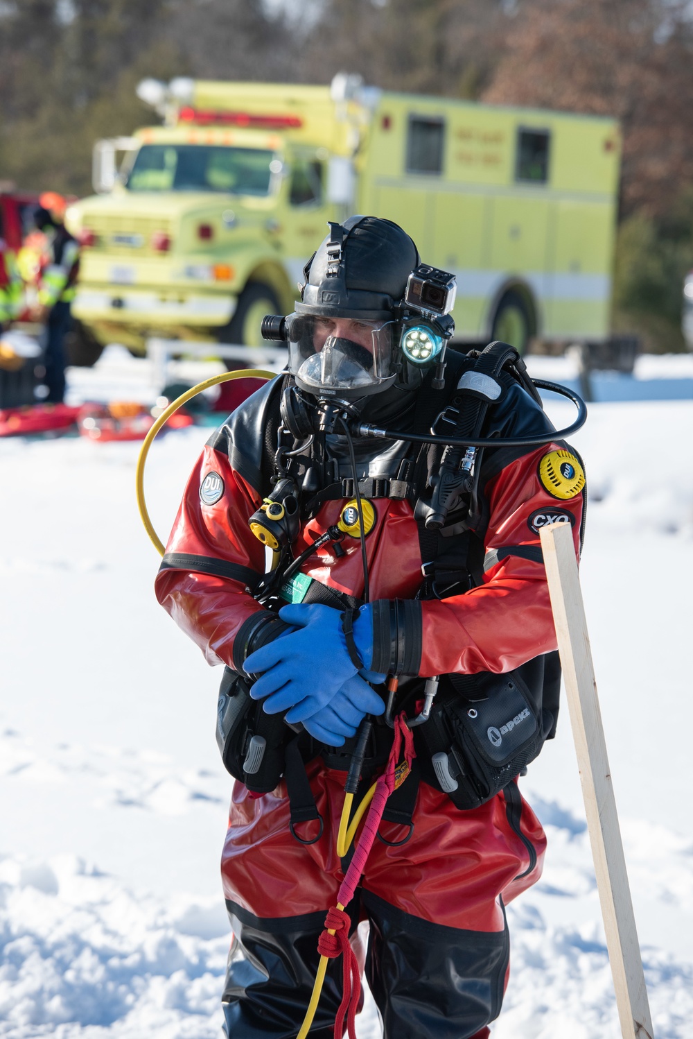 Fort McCoy firefighters practice diving under ice at post’s Big Sandy Lake