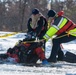 Fort McCoy firefighters practice diving under ice at post’s Big Sandy Lake