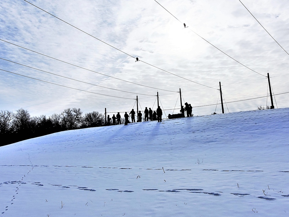 Fort McCoy CWOC class 21-03 students train using snowshoes, ahkio sleds