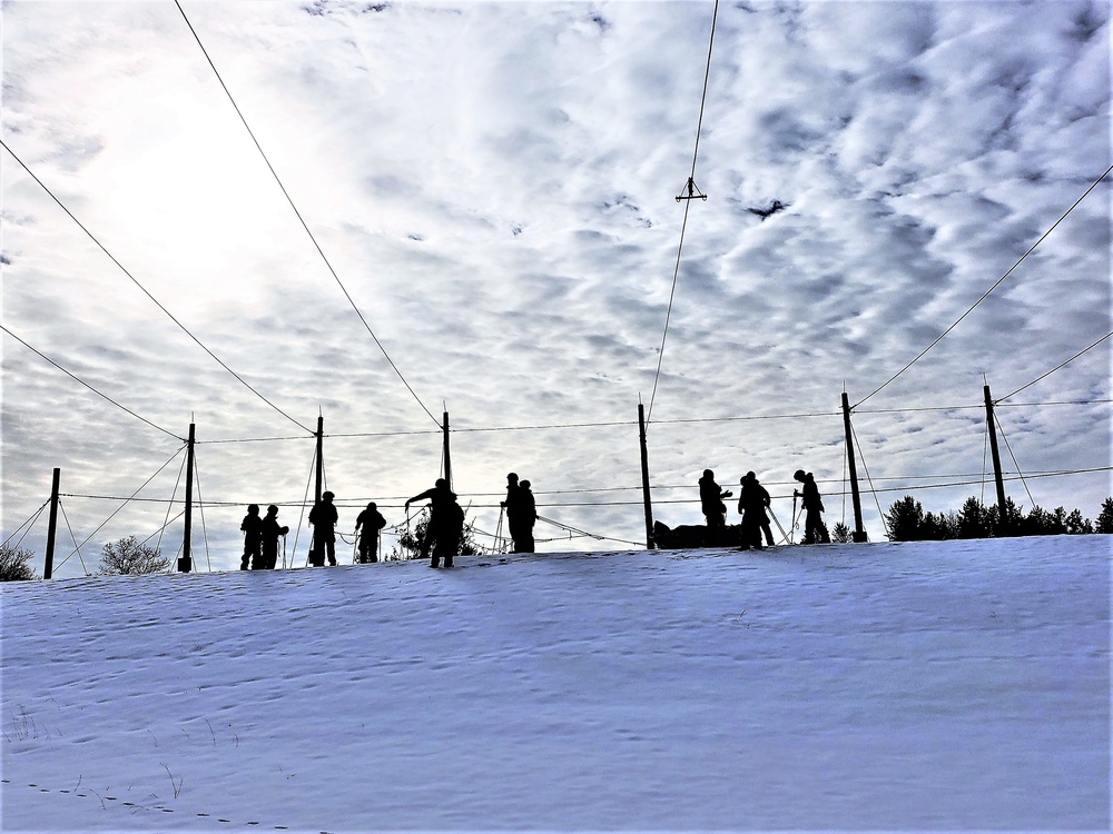 Fort McCoy CWOC class 21-03 students train using snowshoes, ahkio sleds