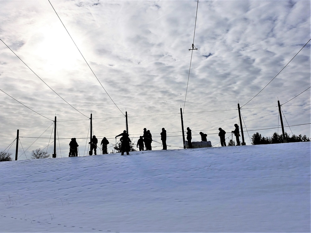 Fort McCoy CWOC class 21-03 students train using snowshoes, ahkio sleds