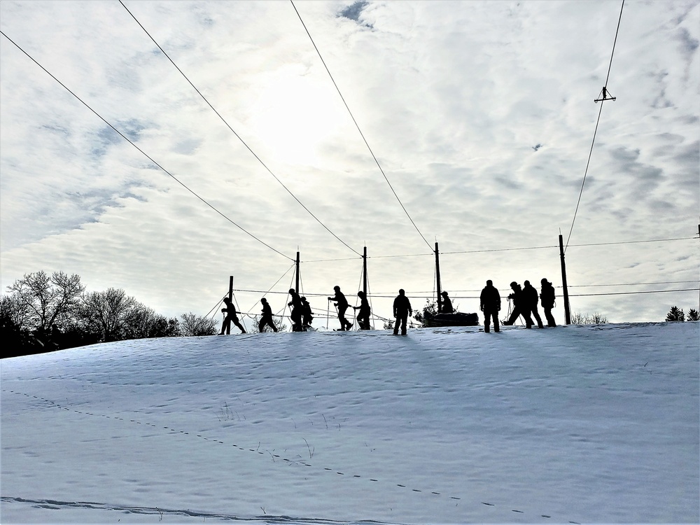 Fort McCoy CWOC class 21-03 students train using snowshoes, ahkio sleds