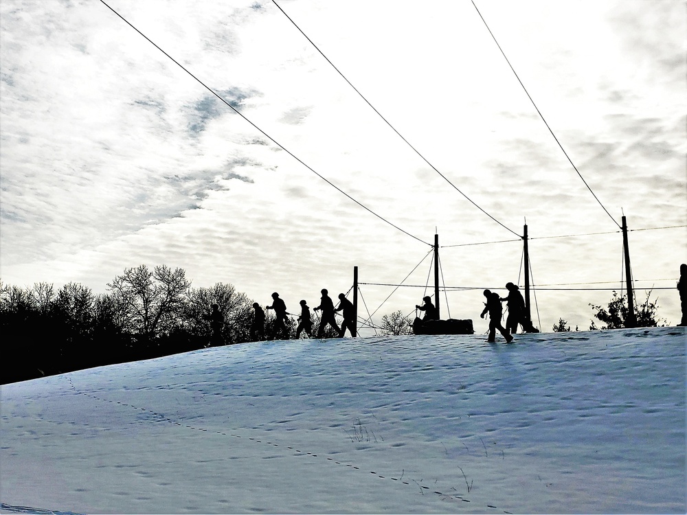 Fort McCoy CWOC class 21-03 students train using snowshoes, ahkio sleds