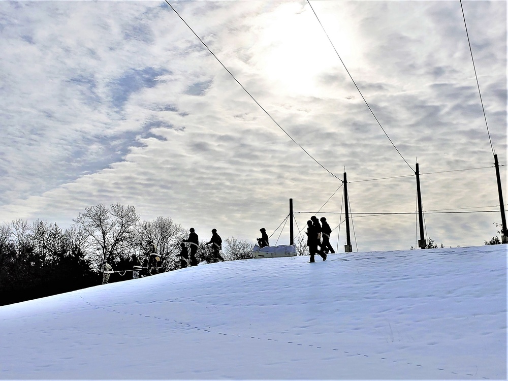 Fort McCoy CWOC class 21-03 students train using snowshoes, ahkio sleds