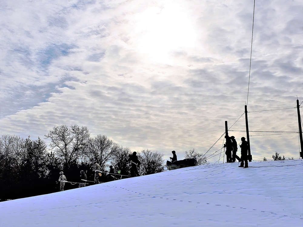 Fort McCoy CWOC class 21-03 students train using snowshoes, ahkio sleds