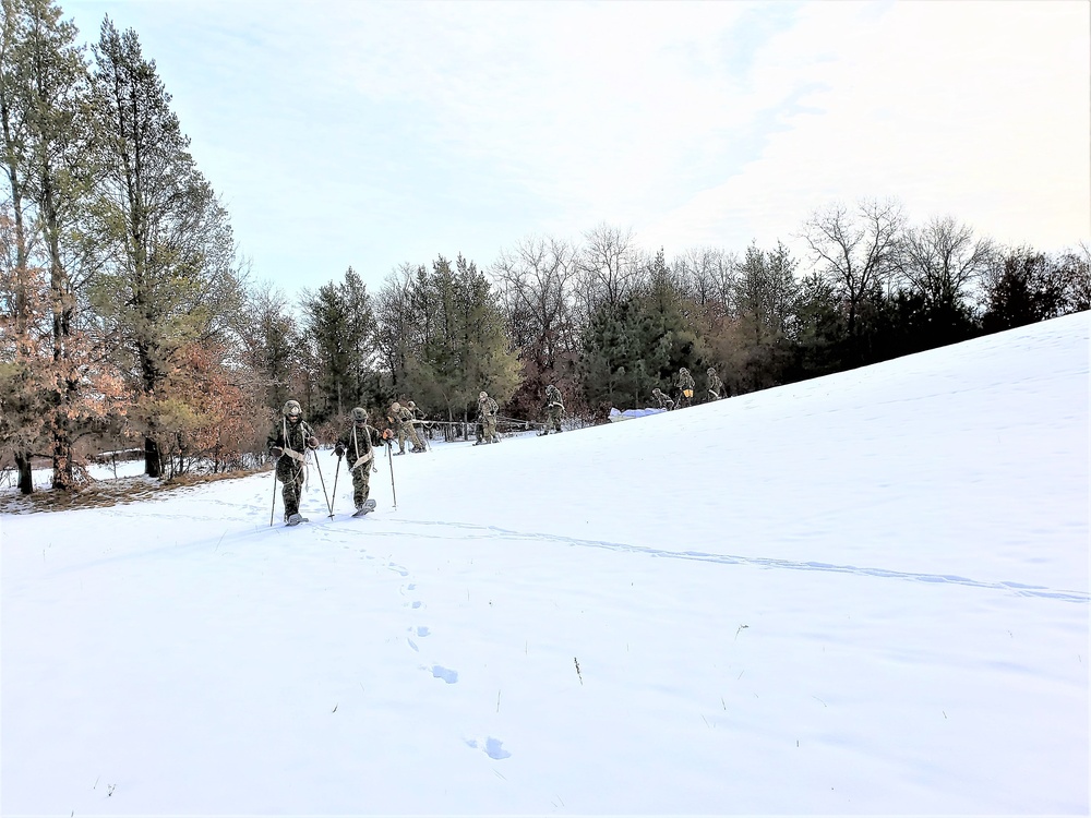 Fort McCoy CWOC class 21-03 students train using snowshoes, ahkio sleds