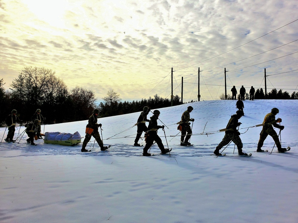 Fort McCoy CWOC class 21-03 students train using snowshoes, ahkio sleds