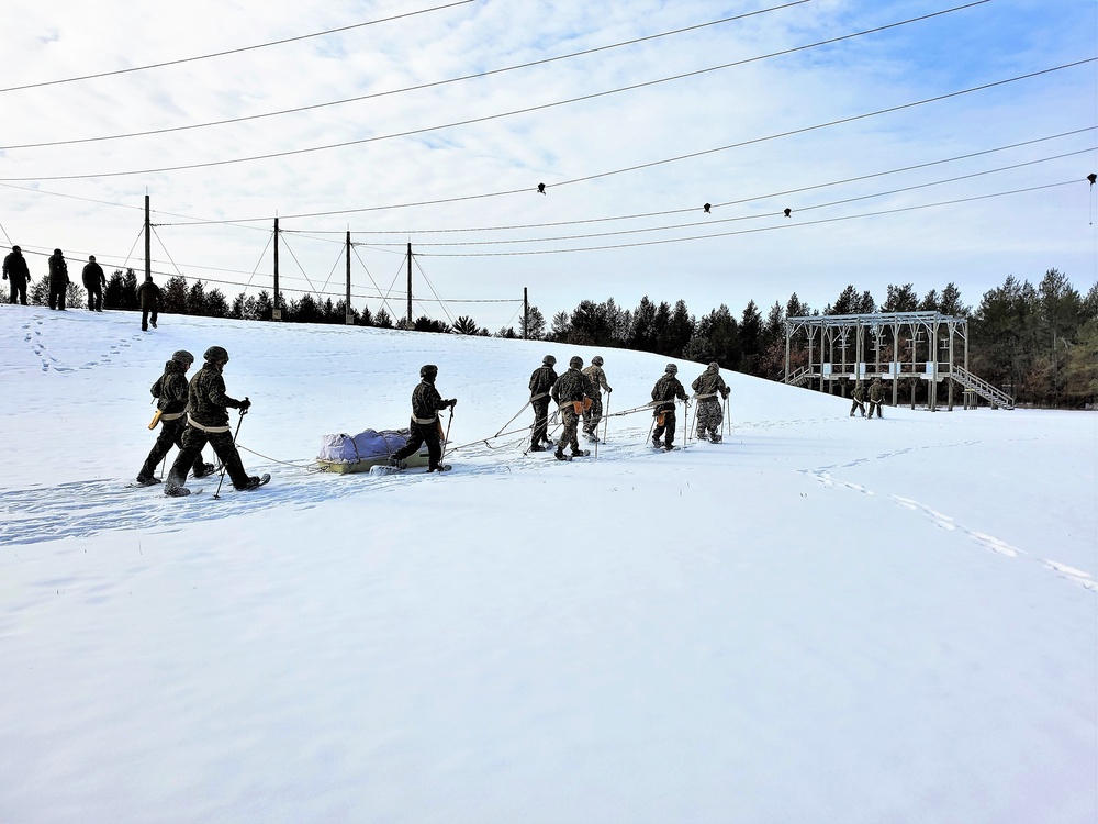 Fort McCoy CWOC class 21-03 students train using snowshoes, ahkio sleds