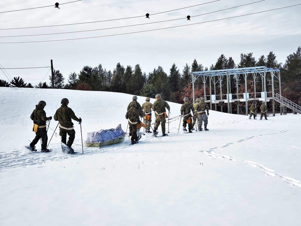 Fort McCoy CWOC class 21-03 students train using snowshoes, ahkio sleds