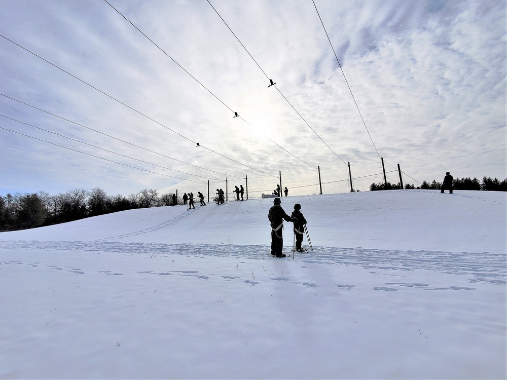 Fort McCoy CWOC class 21-03 students train using snowshoes, ahkio sleds