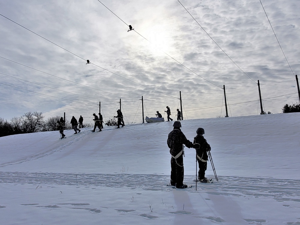 Fort McCoy CWOC class 21-03 students train using snowshoes, ahkio sleds