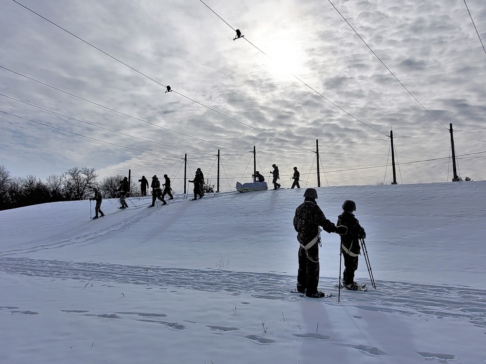 Fort McCoy CWOC class 21-03 students train using snowshoes, ahkio sleds