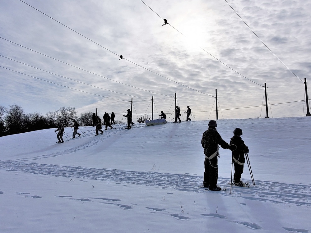 Fort McCoy CWOC class 21-03 students train using snowshoes, ahkio sleds
