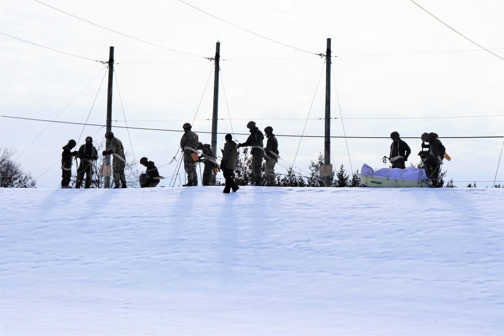 Fort McCoy CWOC class 21-03 students train using snowshoes, ahkio sleds