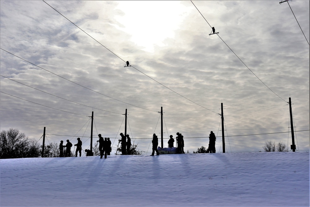 Fort McCoy CWOC class 21-03 students train using snowshoes, ahkio sleds