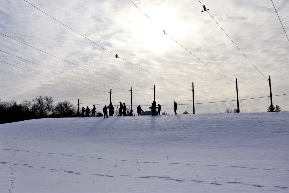 Fort McCoy CWOC class 21-03 students train using snowshoes, ahkio sleds