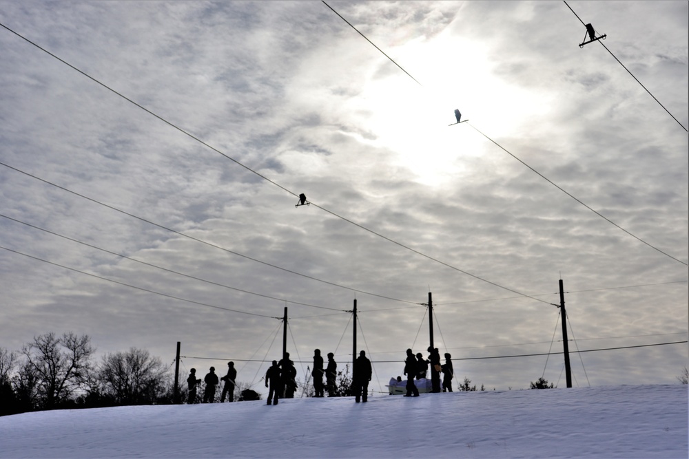 Fort McCoy CWOC class 21-03 students train using snowshoes, ahkio sleds