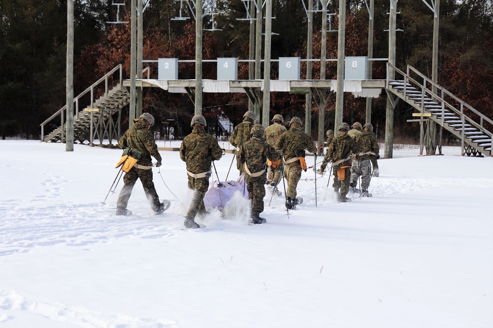 Fort McCoy CWOC class 21-03 students train using snowshoes, ahkio sleds