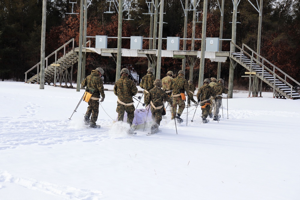 Fort McCoy CWOC class 21-03 students train using snowshoes, ahkio sleds