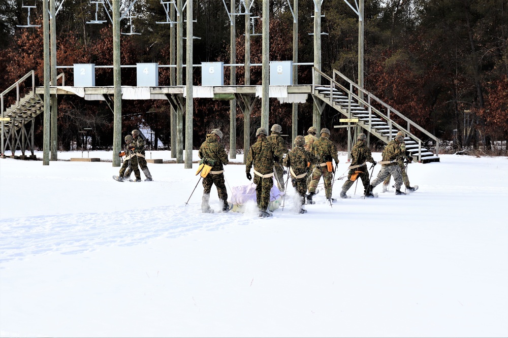 Fort McCoy CWOC class 21-03 students train using snowshoes, ahkio sleds
