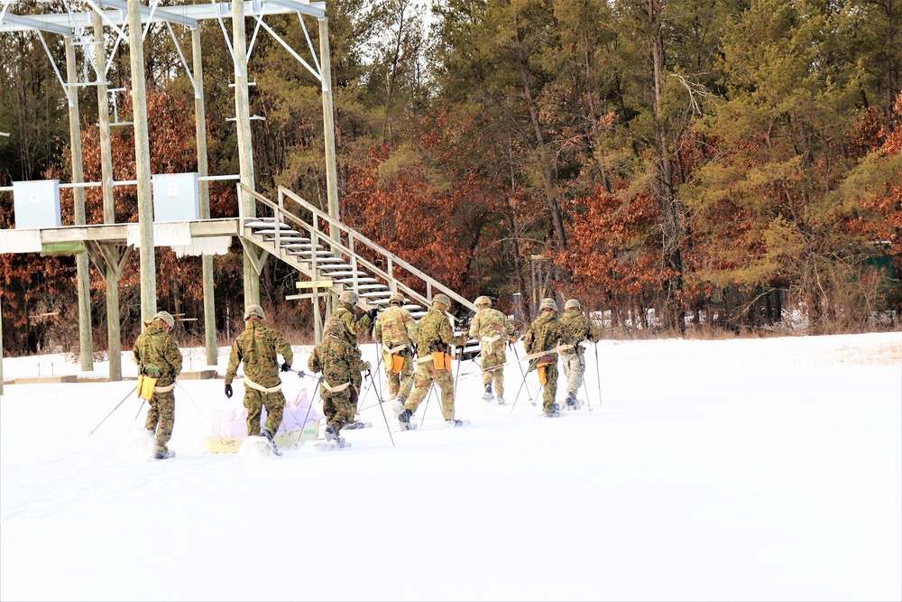 Fort McCoy CWOC class 21-03 students train using snowshoes, ahkio sleds