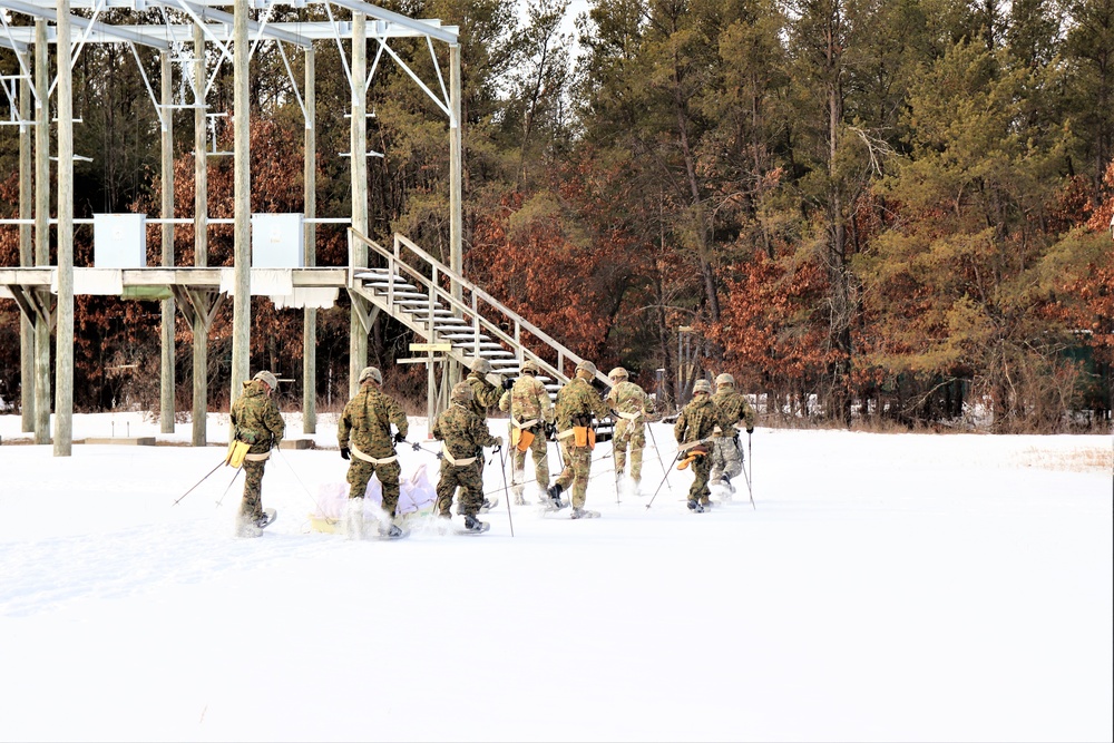 Fort McCoy CWOC class 21-03 students train using snowshoes, ahkio sleds