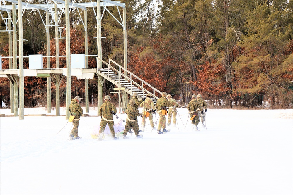 Fort McCoy CWOC class 21-03 students train using snowshoes, ahkio sleds
