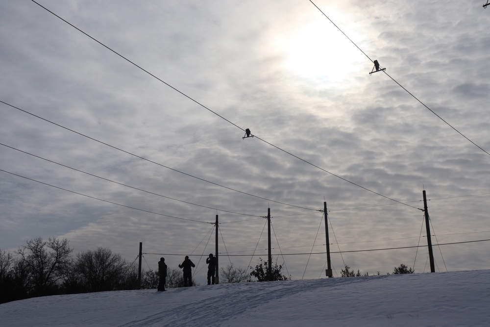 Fort McCoy CWOC class 21-03 students train using snowshoes, ahkio sleds