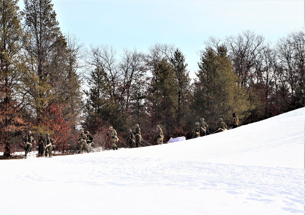 Fort McCoy CWOC class 21-03 students train using snowshoes, ahkio sleds