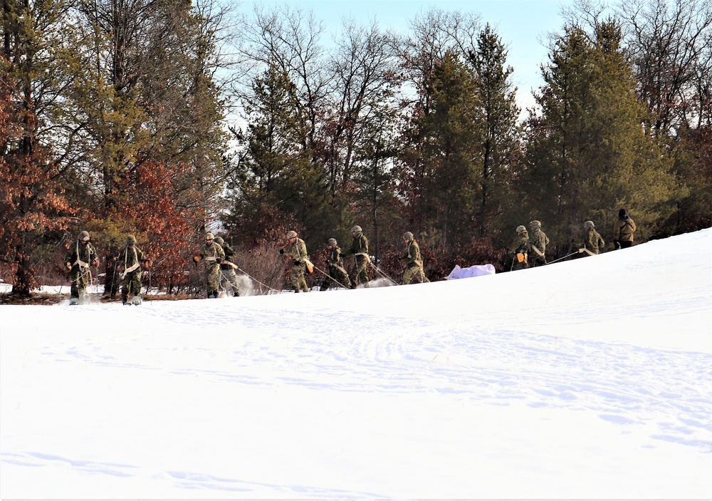 Fort McCoy CWOC class 21-03 students train using snowshoes, ahkio sleds