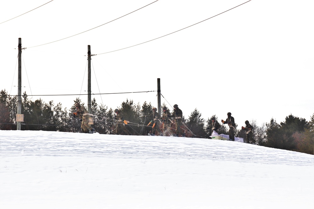 Fort McCoy CWOC class 21-03 students train using snowshoes, ahkio sleds