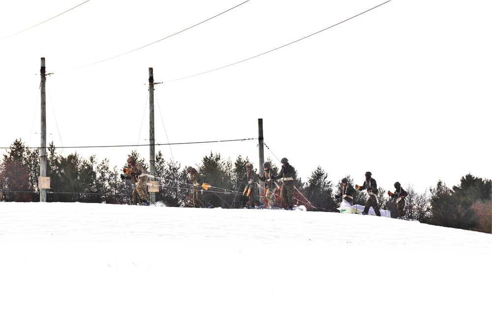 Fort McCoy CWOC class 21-03 students train using snowshoes, ahkio sleds