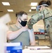 Massachusetts military forces join together to administer vaccine
