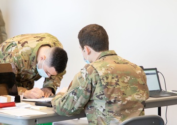 Massachusetts military forces join together to administer vaccine