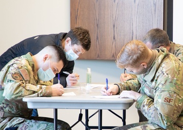 Massachusetts military forces join together to administer vaccine